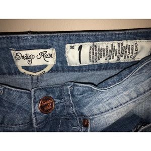 Distressed light wash jeans